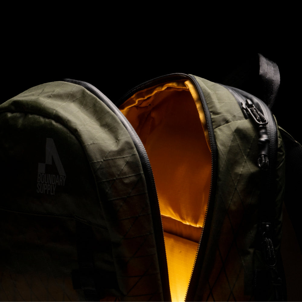 Minimalist backpack with illuminated interior